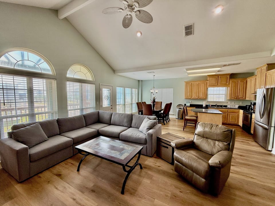 Living room is open to kitchen/dining area
