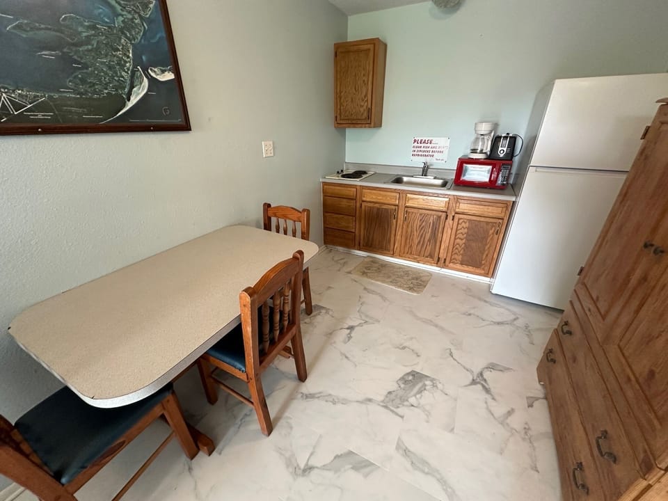 Kitchenette with drip coffee, microwave and toaster