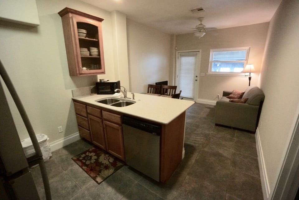 Down Unit view from front door of Kitchen, Island and Living areas