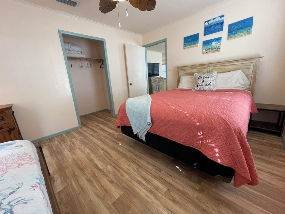 Bedroom 2 has one queen and one twin