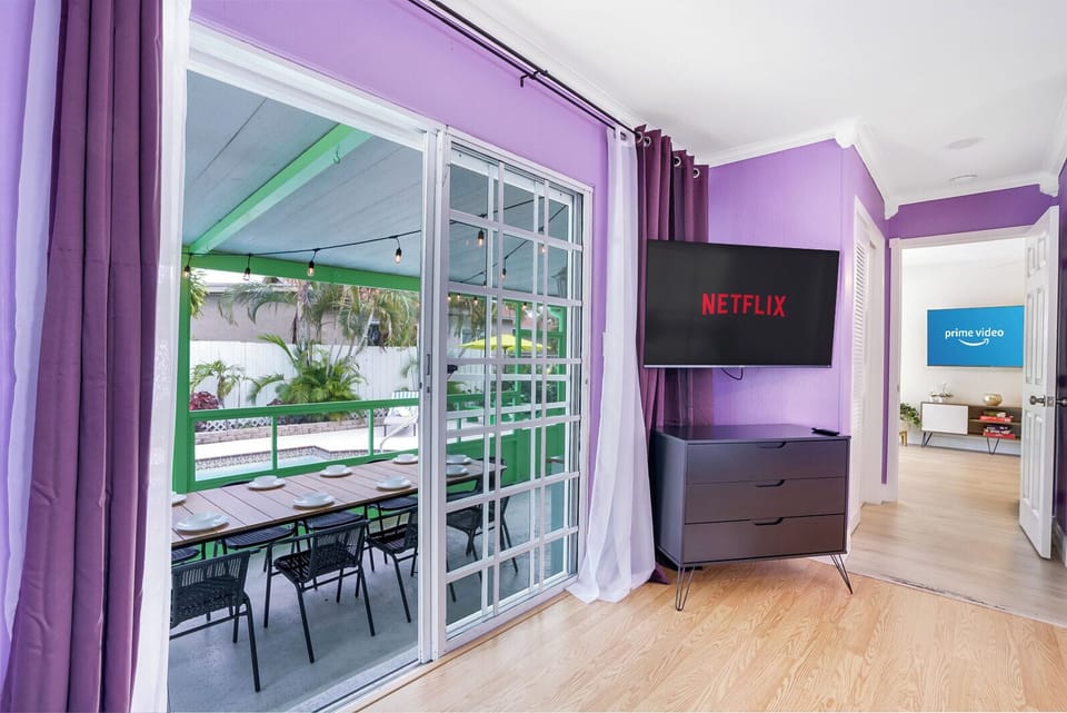 Master Bdrm. Doors to Screened Porch-Easy access to pool/backyard--50" UHD TV
