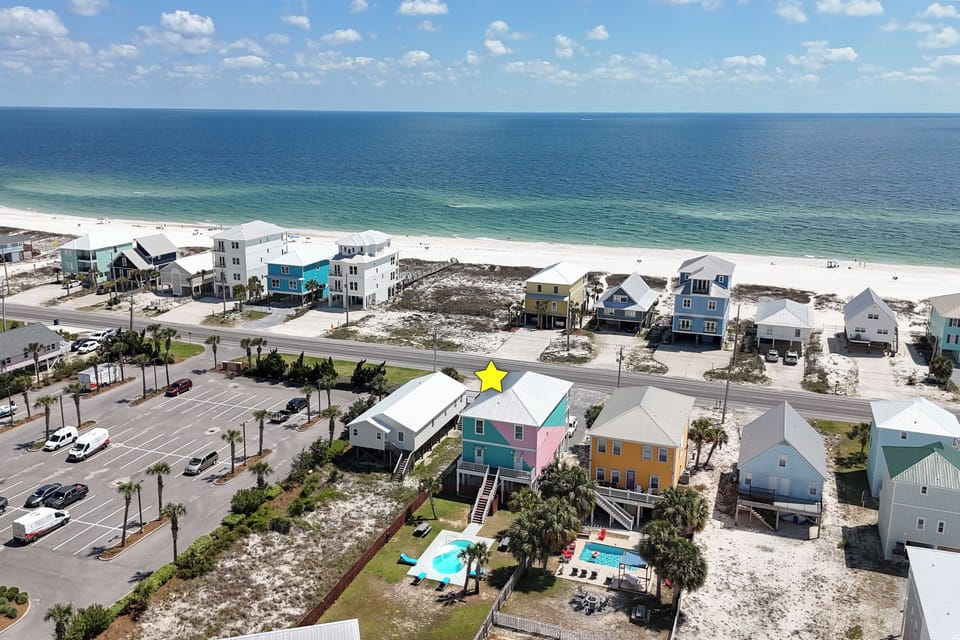 Colorful beach home with full Gulf views and easy walk to the white sand!