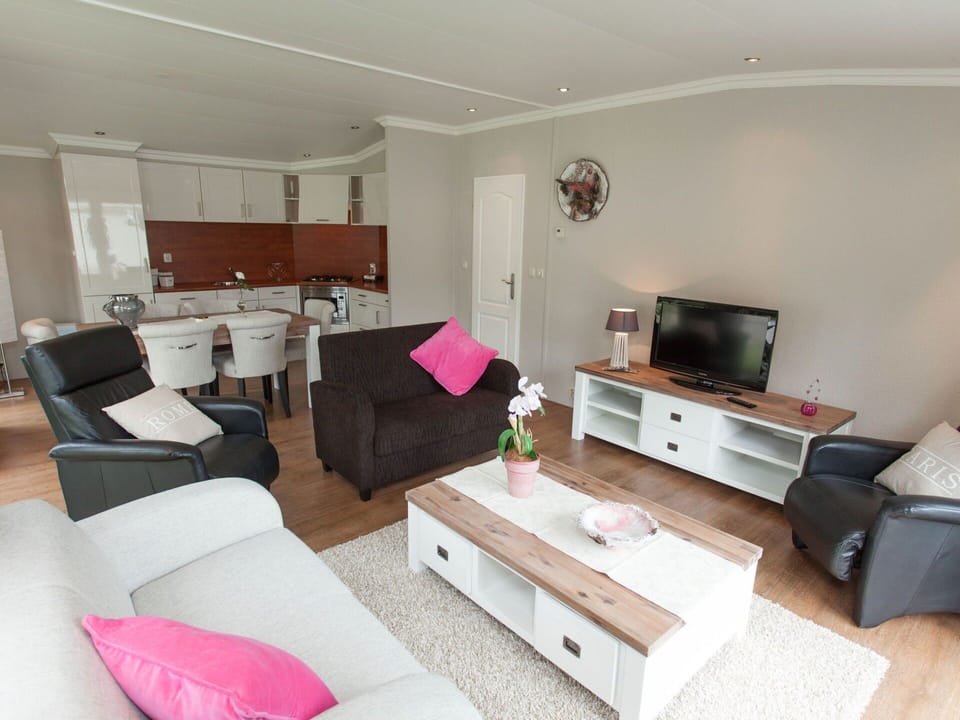Furniture, Property, Couch, Table, Comfort, Television, Interior Design, Floor, Pillow, Flooring