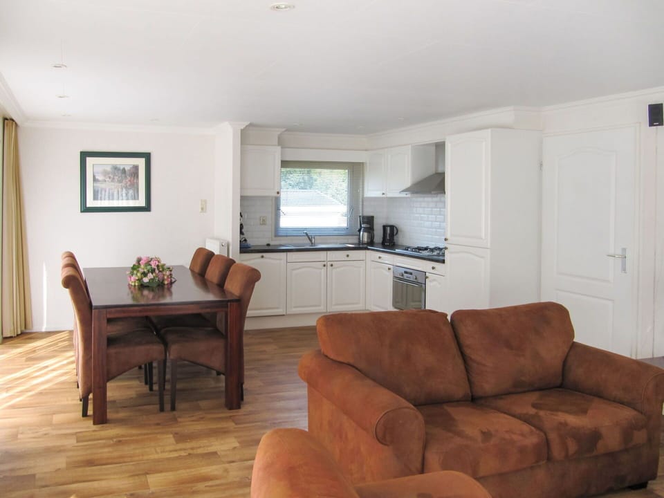 Brown, Furniture, Property, Picture Frame, Couch, Table, Wood, Lighting, Comfort, Interior Design