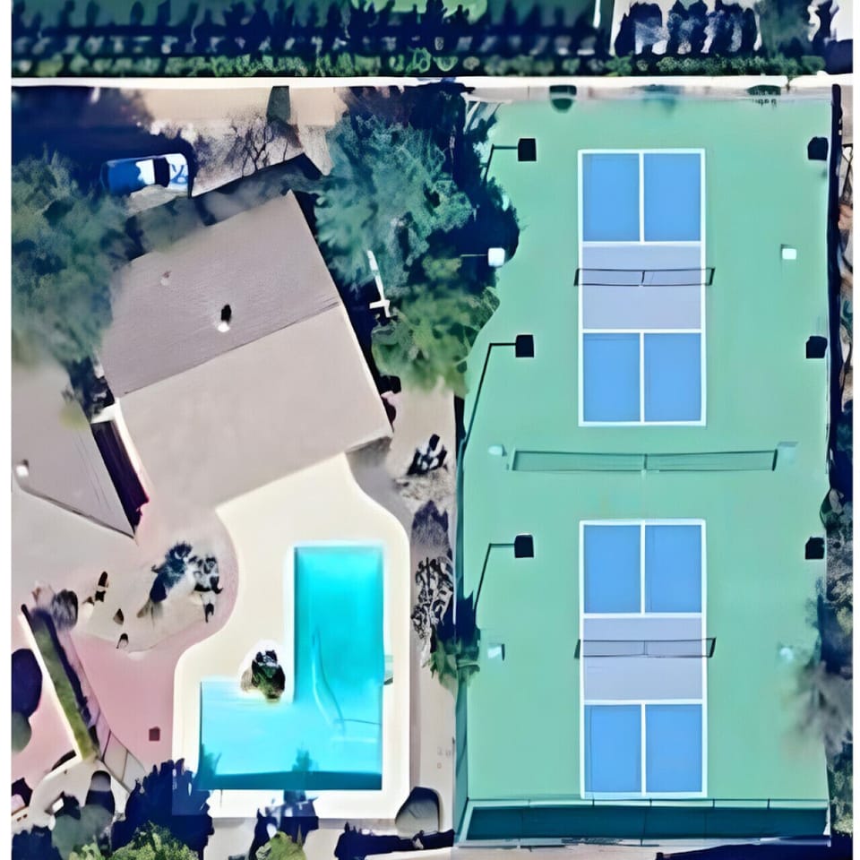 Sky view | guesthouse opens to pool and pickelball courts
