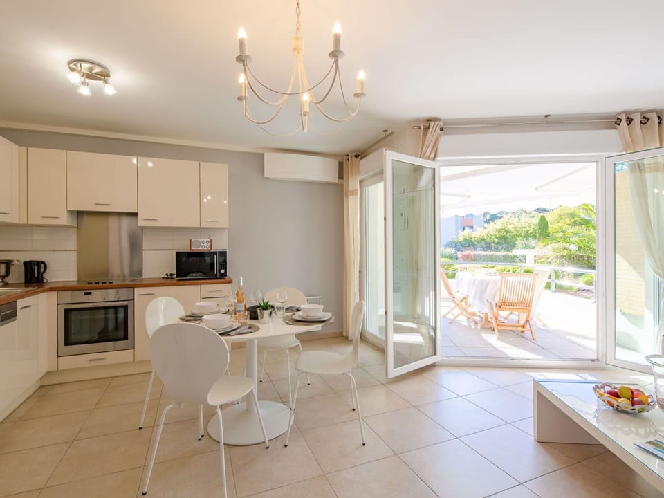 Furniture, Table, Countertop, Chair, Wood, Kitchen, Cabinetry, Floor, Flooring, Wall