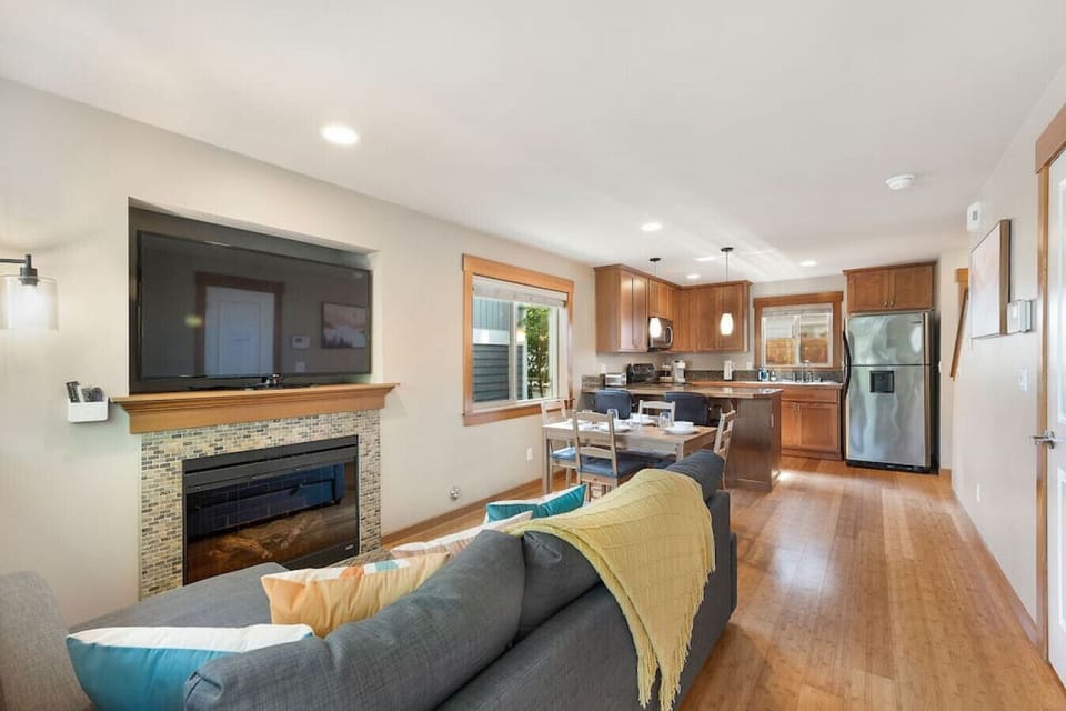 Sunshine beautifully accents the hardwood floors and details.