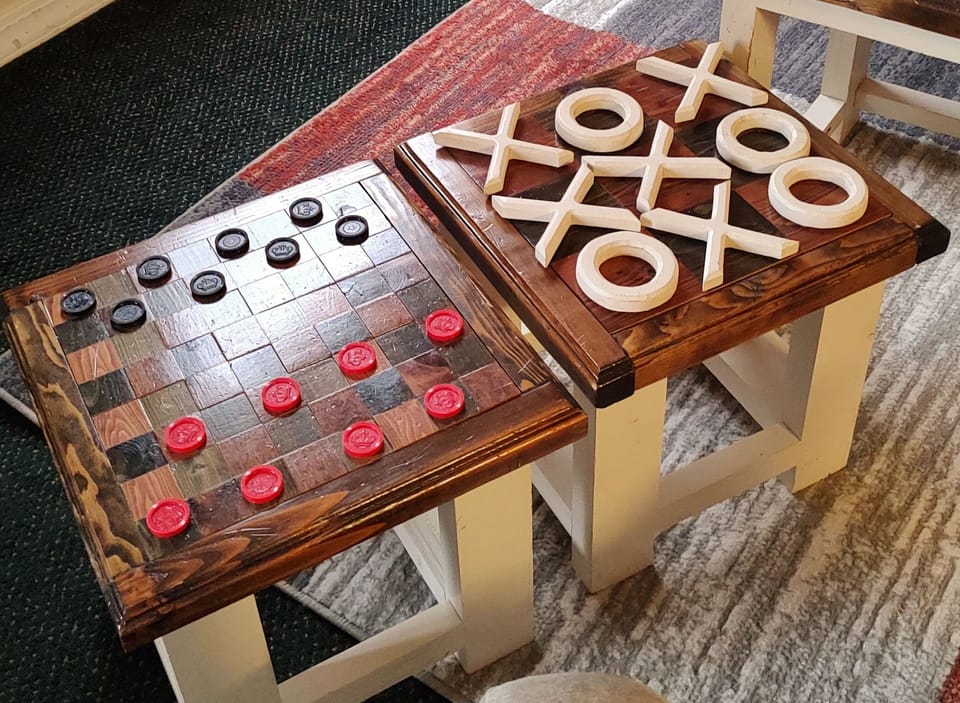 Over Size Checkers and Tic Tac Toe