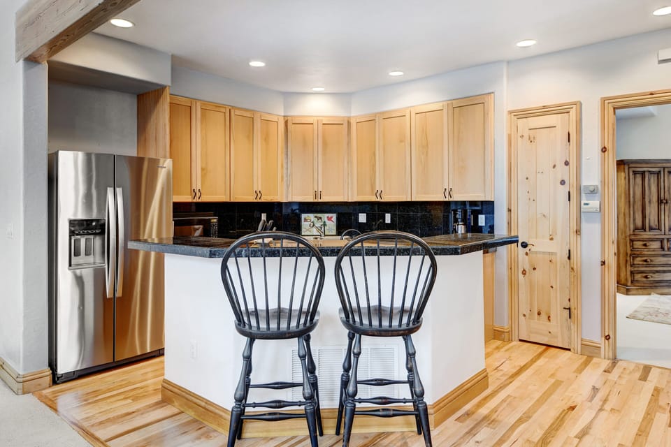 Kitchen Area With Island Seating For 2 People