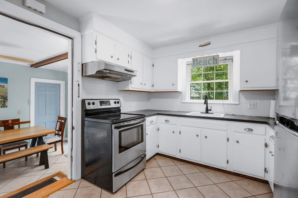 Dining area off of fully equipped kitchen