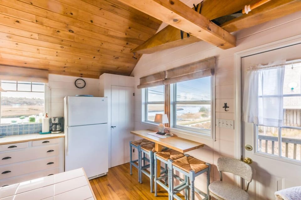 Kitchen/dining area with ocean views.
