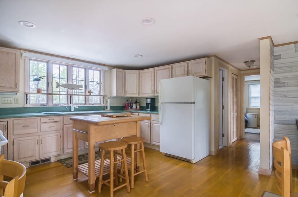 Kitchen with small island for two guests.