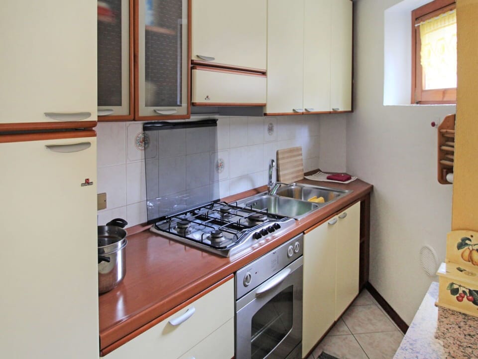 Cabinetry, Countertop, Kitchen Sink, Sink, Kitchen Appliance, Gas Stove, Kitchen Stove, Kitchen, Cooktop, Home Appliance