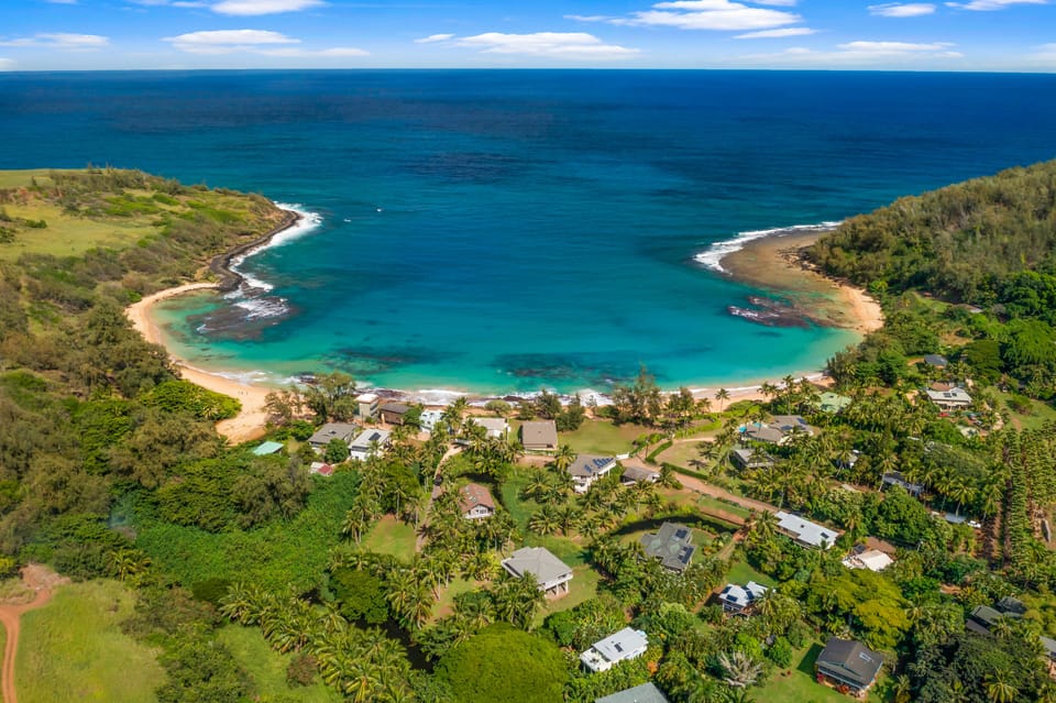 Aerial view of Moloaa Bay with property in foreground.