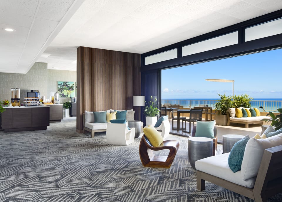 Gather in the airy lounge, then step out to sea breezes.
