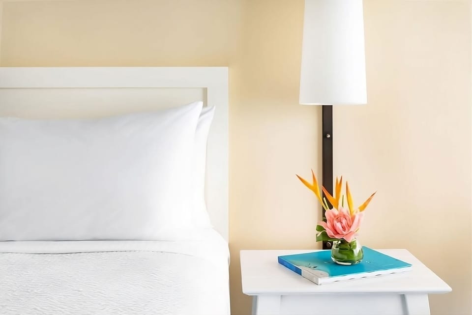 Unwind with soft bedside lighting and fresh, crisp linens.