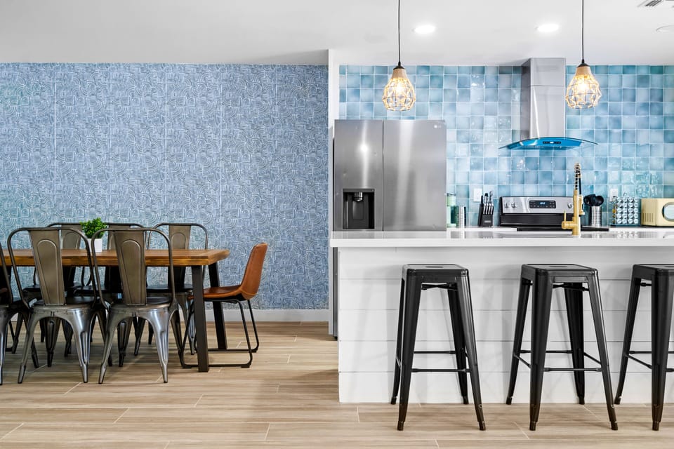 Unit 1: Full dine-in kitchen and open living area built to entertain guests