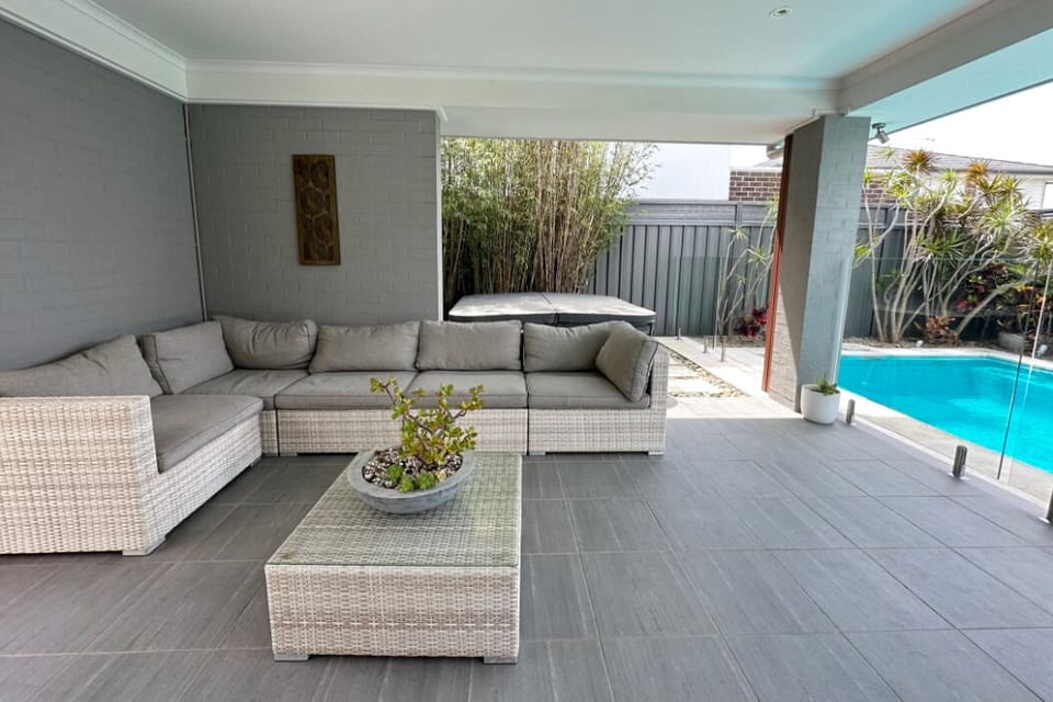 A great place to relax undercover and protected outside near Pool and Spa