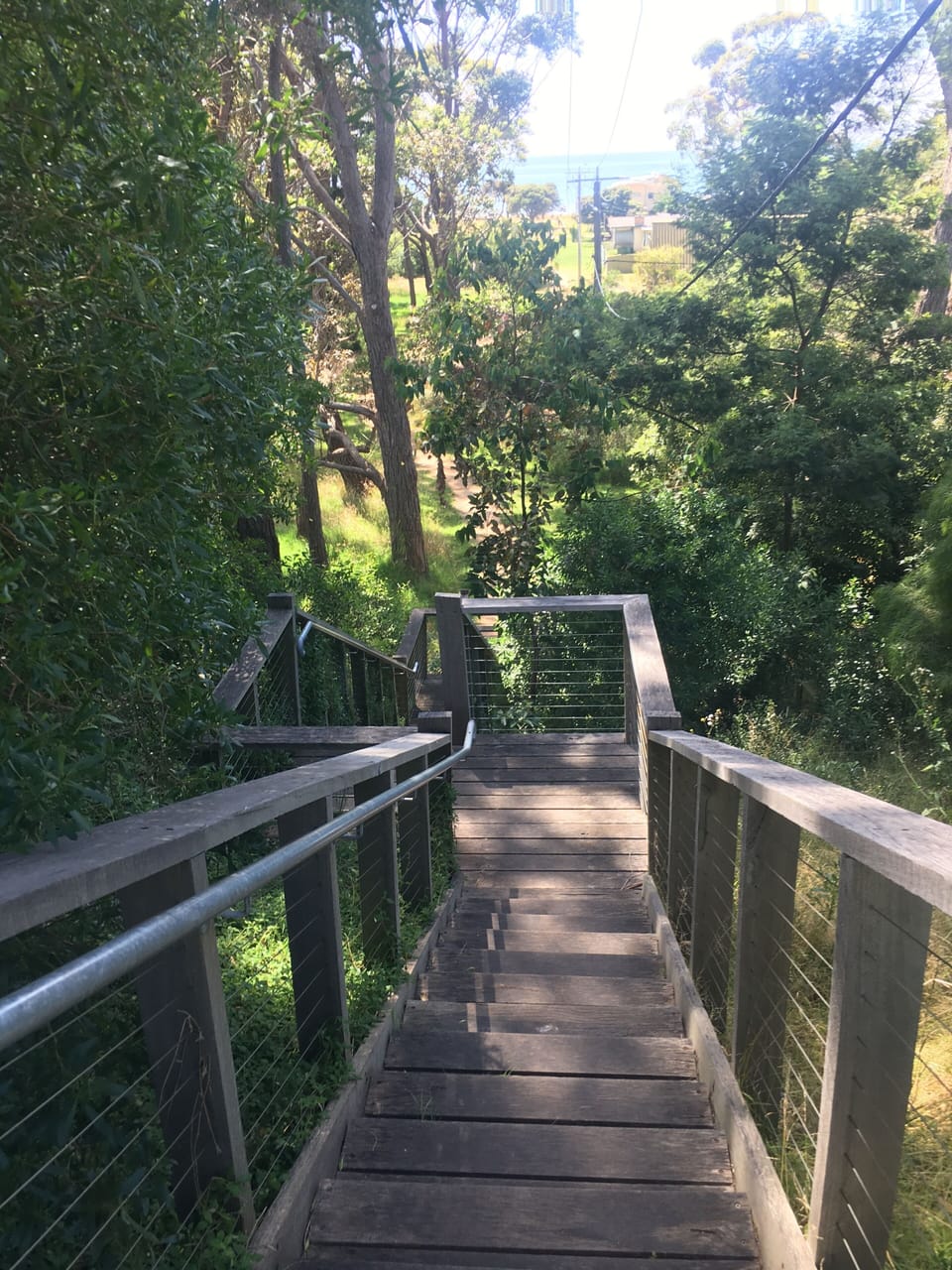 Stairs at the front gate down through reserve to beautiful sandy beach.