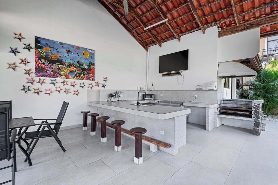 Community Kitchen Area: Chill in style, with the perfect setting for friends.
