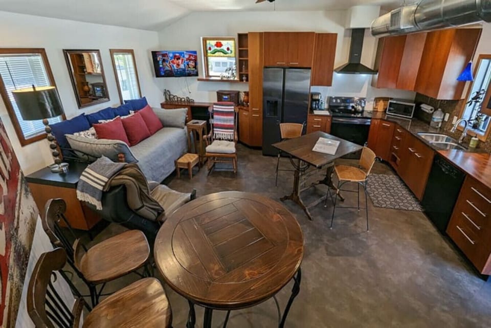 Front Office-Living Room. We gave it a test run, and had a casual dinner for 9 with comfort.