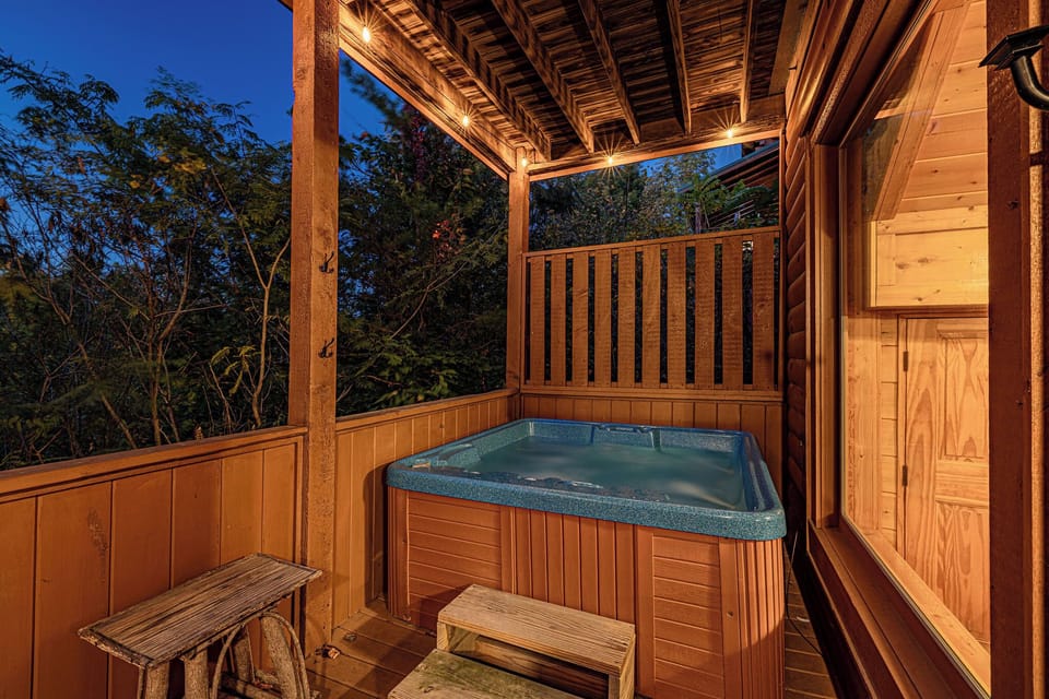 What's better than relaxing in a private hot tub while staying at a cabin in the mountains? The hot tub is located on the lower back deck with privacy screen.