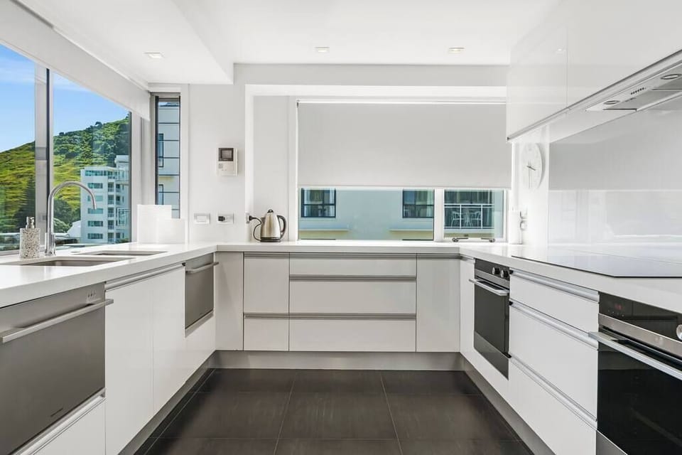 Gourmet Entertainers kitchen with two ovens, two dishwashers and large double door fridge