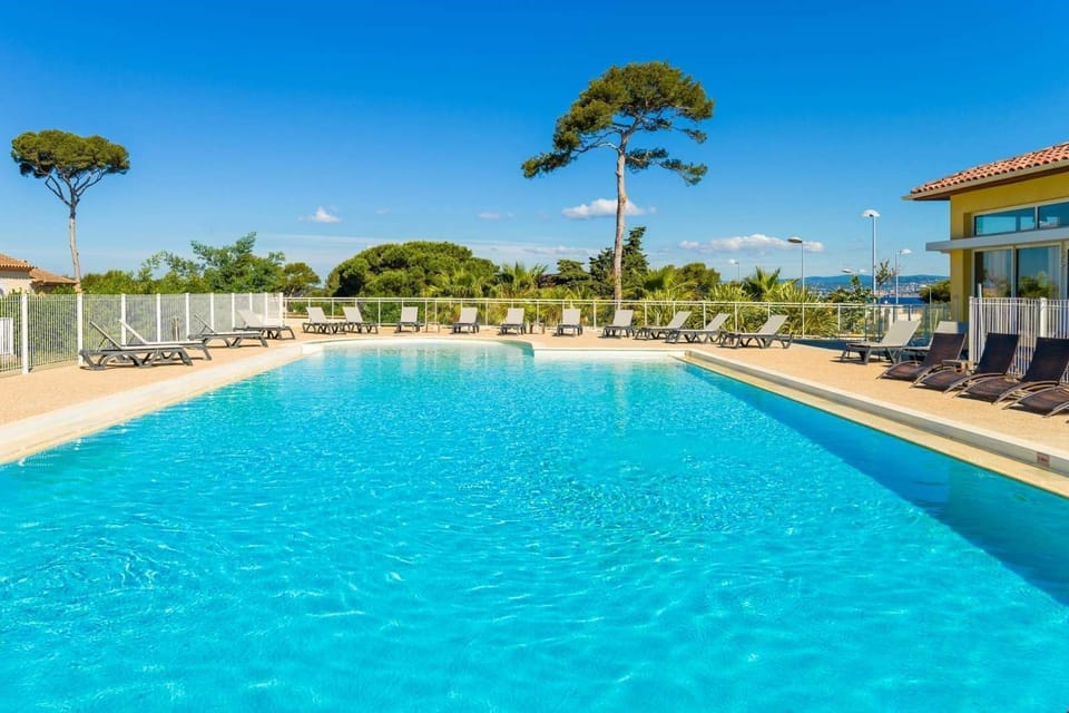 Dive into the lovely seasonal outdoor pool.