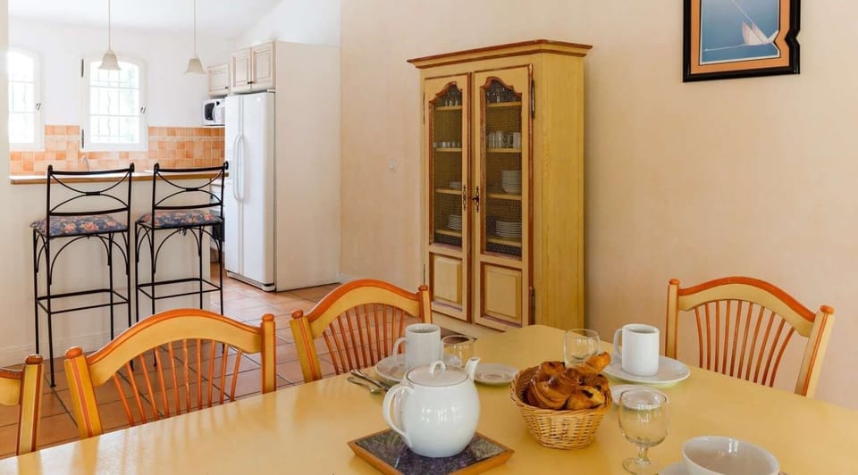 Entertain and enjoy meals together at the dining room table.