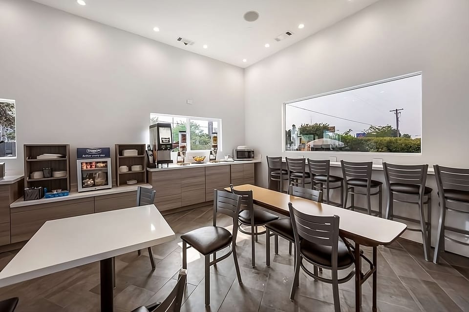 Sip fresh coffee and enjoy a bright, comfortable breakfast setup.