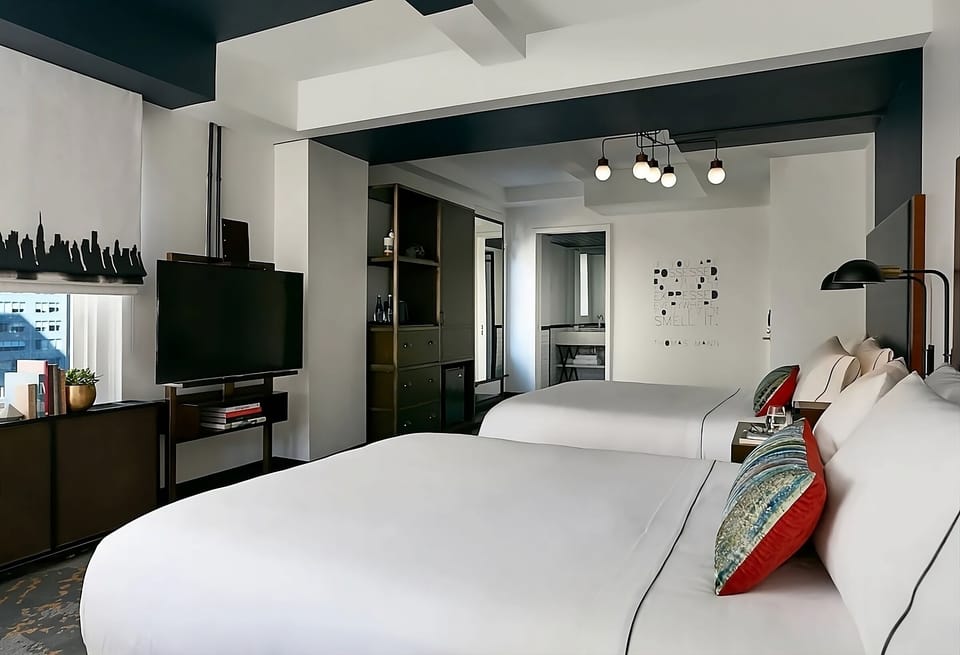 Settle in with roomy comfort, TV entertainment, and desk nook.