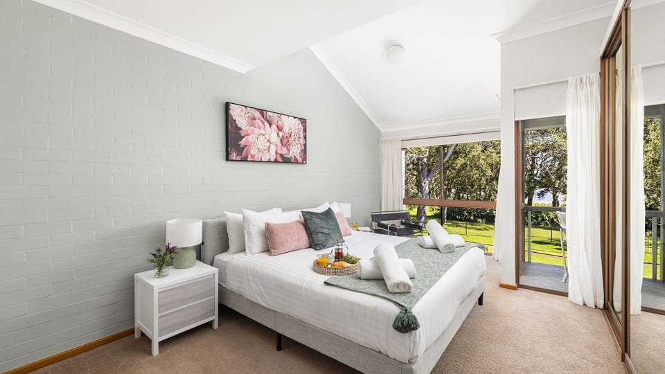 Sunset at the Moorings | Bedroom | King bed | Wardrobe | Views