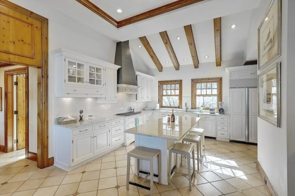 Spacious, luxury gourmet kitchen equipped with high-end appliances and plenty of counter space for culinary adventures.