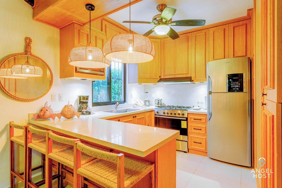 A fully-equipped kitchen to prepare meals at home