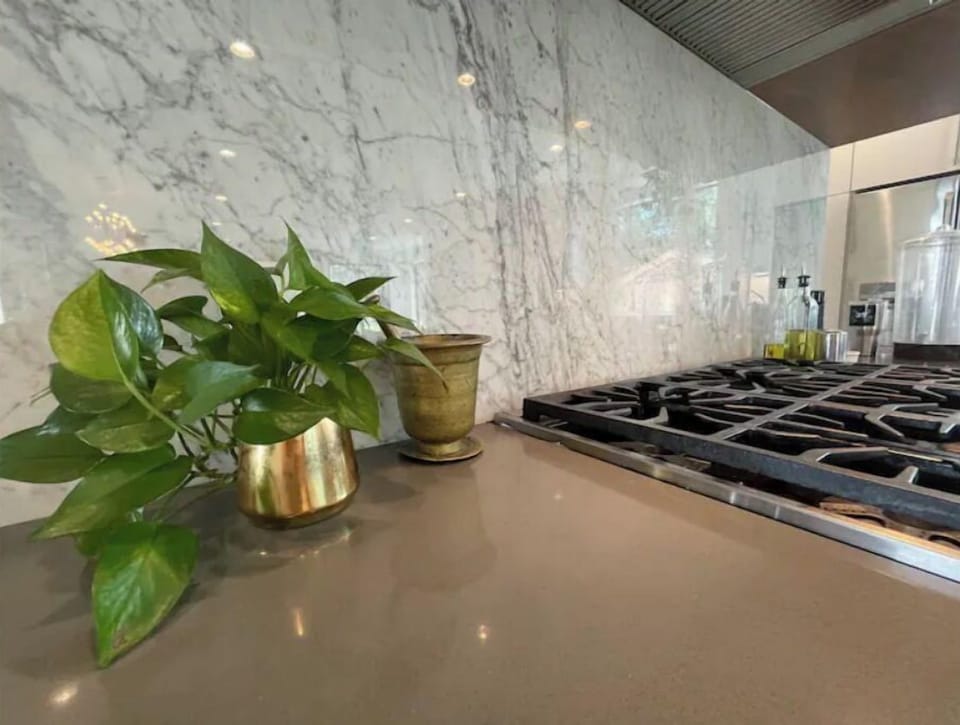 Carera marble backsplash in the kitchen. 