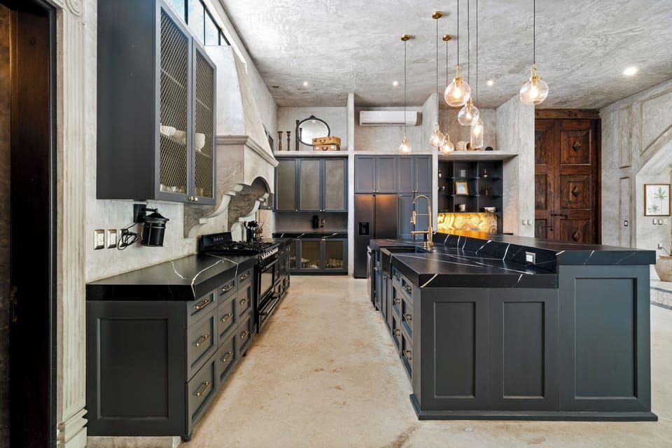 Beautiful black countertops with plenty of storage