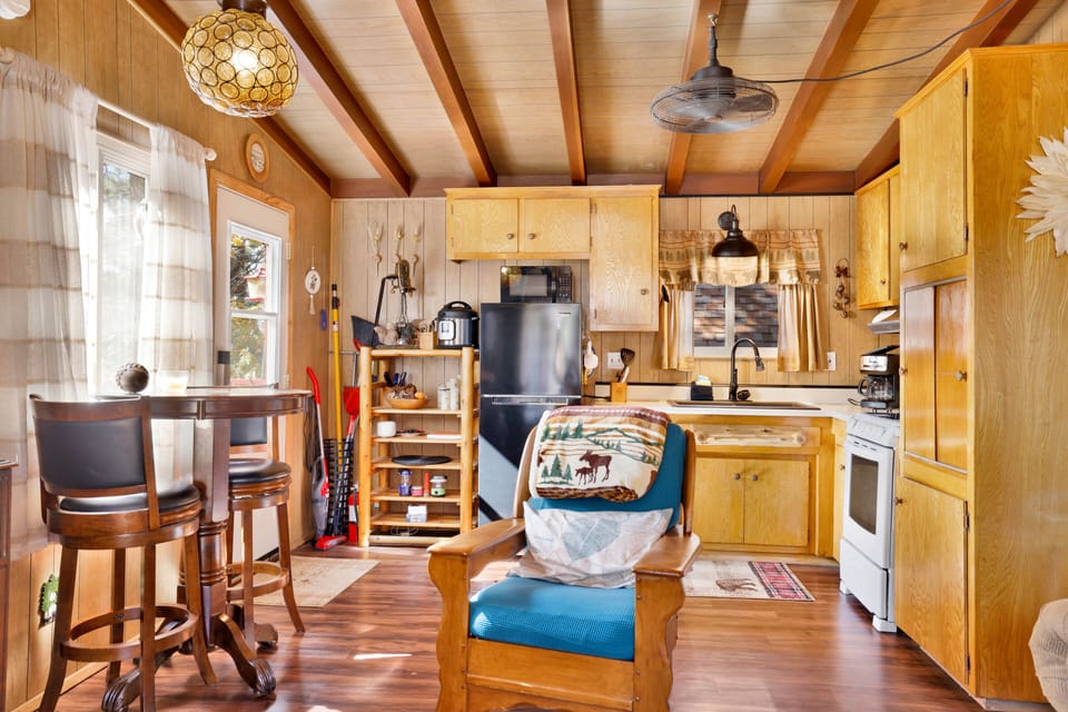 Warm wood tones meet modern appliances and clean surfaces