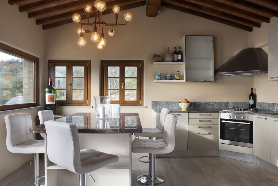 Furniture, Cabinetry, Property, Table, Countertop, Window, Chair, Lighting, Wood, Kitchen Stove