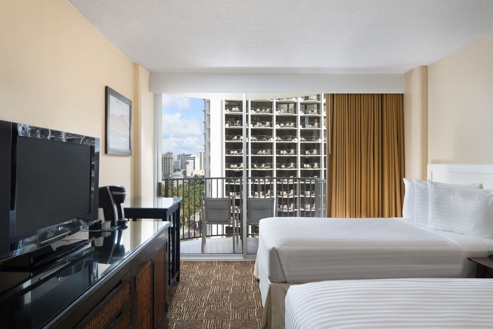 Relax with a spacious layout and easy balcony access.