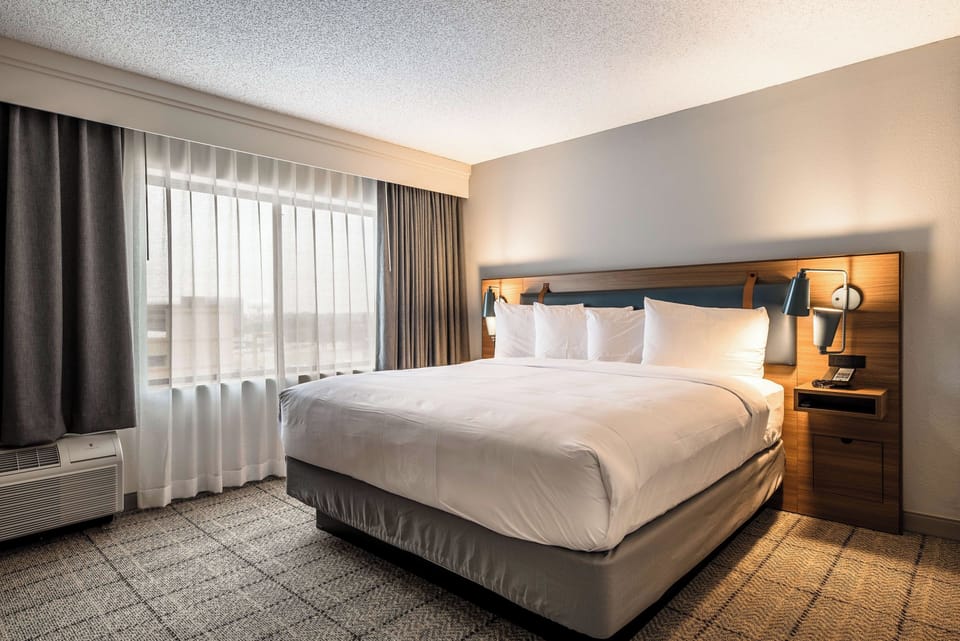 Sink into crisp linens and wake up to soft daylight.