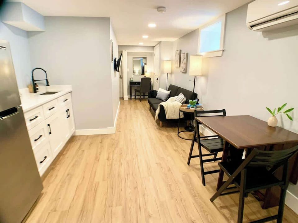 Dining area: Modern extendable dining table. 
We are displaying here the 2 chair configuration. 

There are other 2 chairs folded at the end of the studio and the table extends to accommodate 4 people comfortably. 