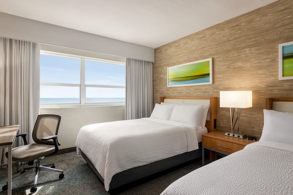 Unit with 2 Double Beds. Exact unit will be assigned upon arrival. Views, colors and decor may vary.
