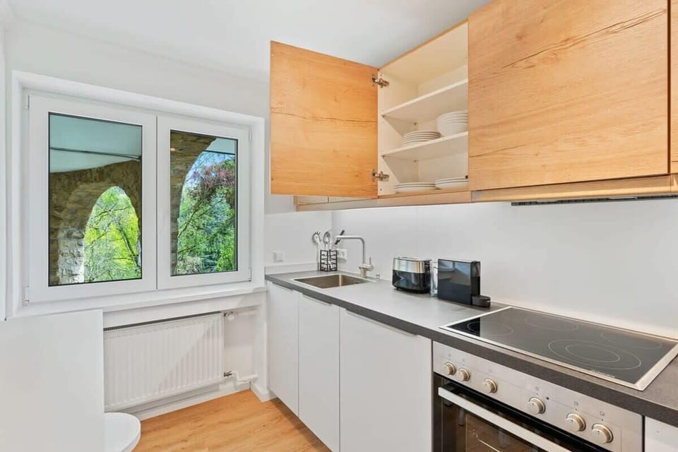 Modern kitchen with a beautiful view, making meal prep a delight.