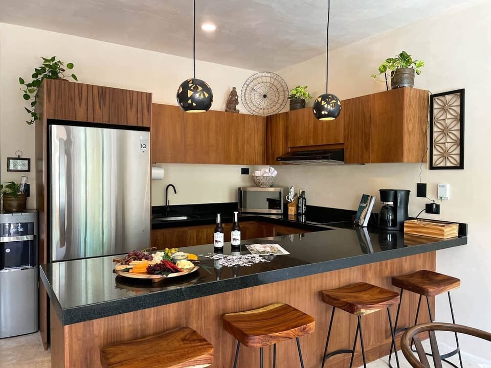 Luxury finishes include solid granite countertops and stainless steel appliances