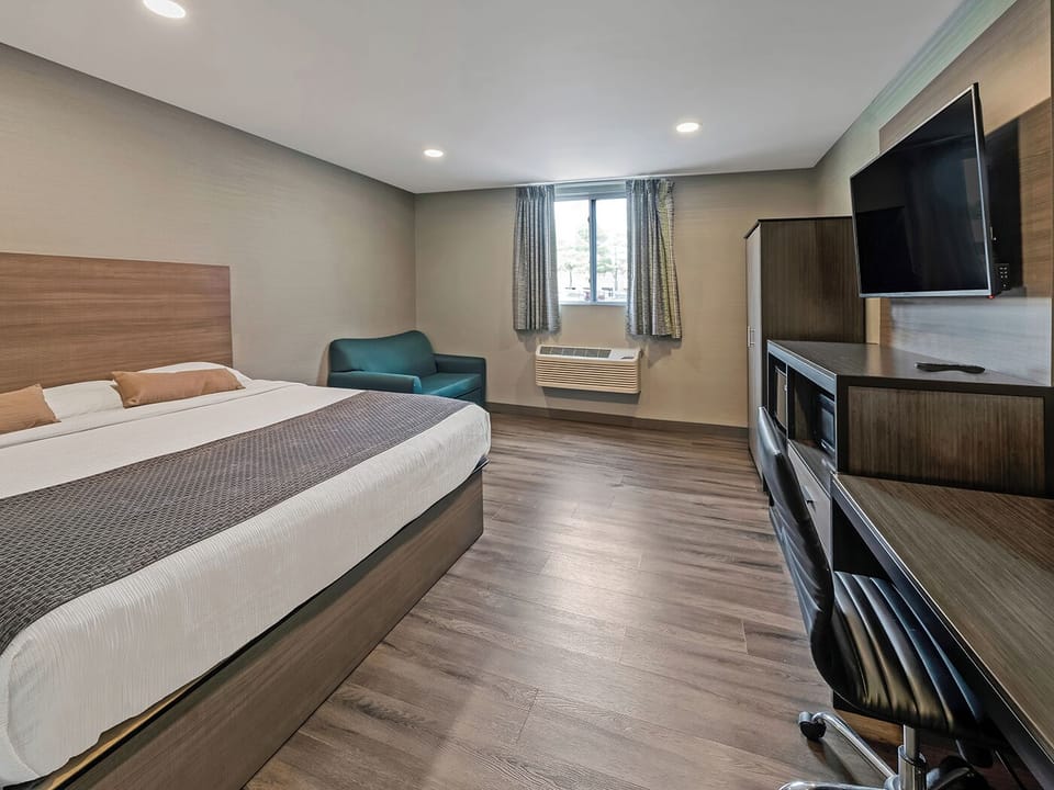 Stretch out and stream your favorites in this spacious room.