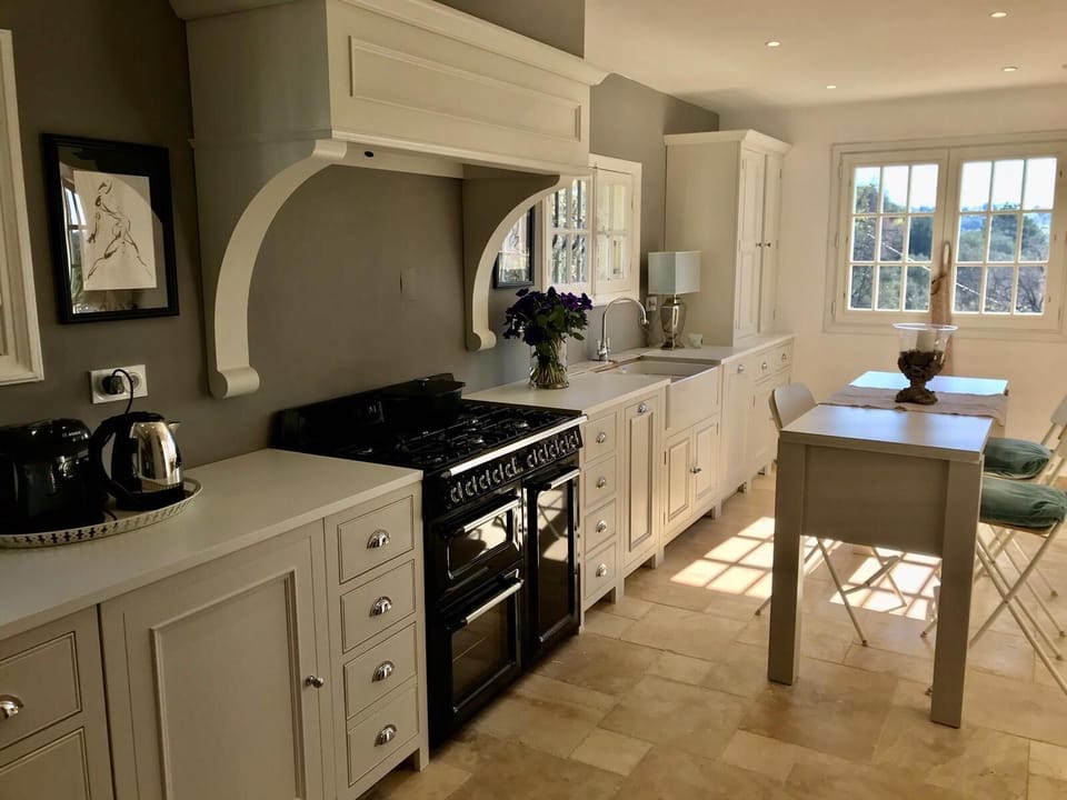 Kitchen with large window view of the valley