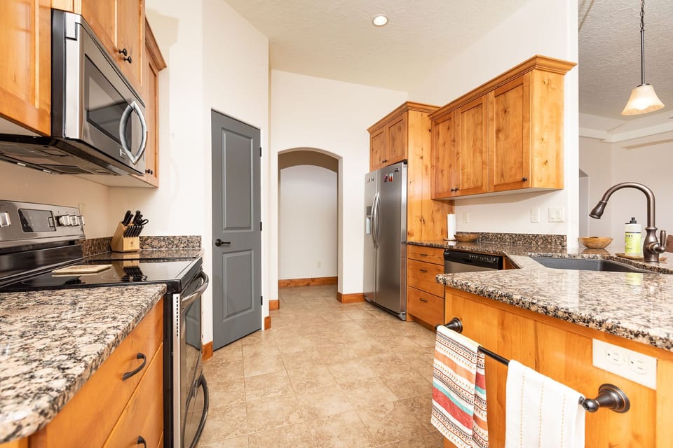 Spacious kitchen stocked with everything you need. 