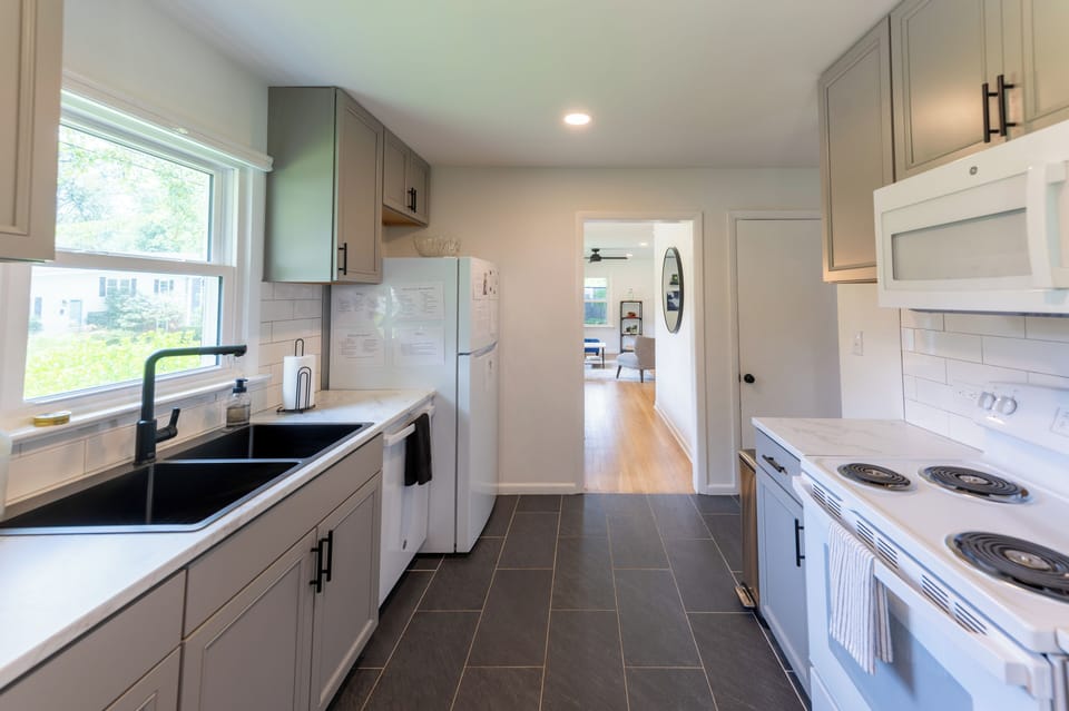 The kitchen also includes a crock pot, coffee maker, toaster, and more!