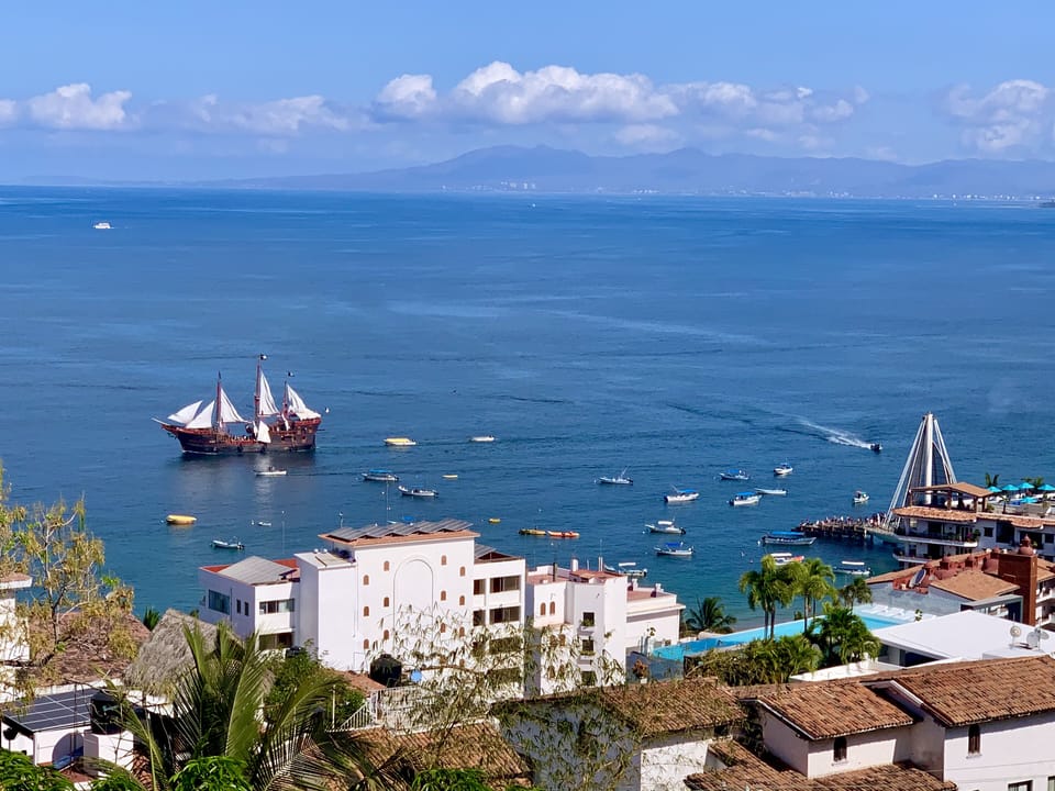 Picture taken from balcony of villa showing Los Muertos pier and pirate ship.