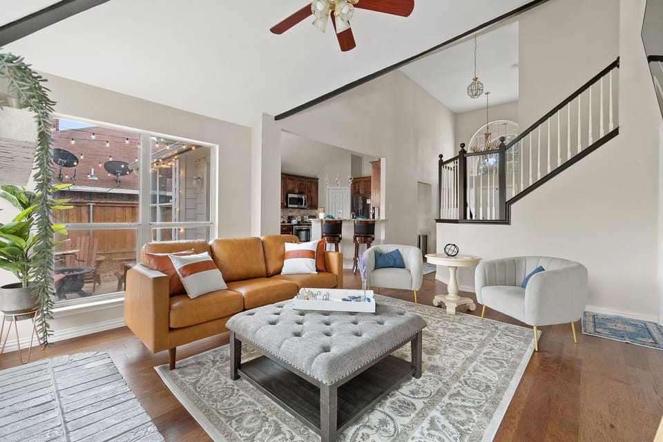 Beautiful & elegant living room with designer sofa and chairs. 